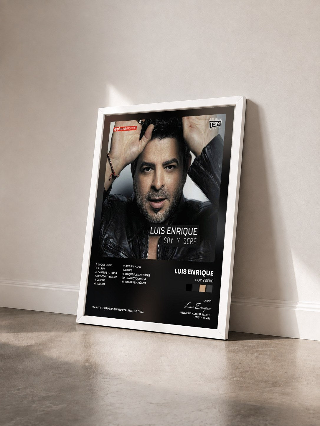 #blanc Tableau de l'album Soy Y Seré de Luis Enrique vu de trois quarts, cadre blanc