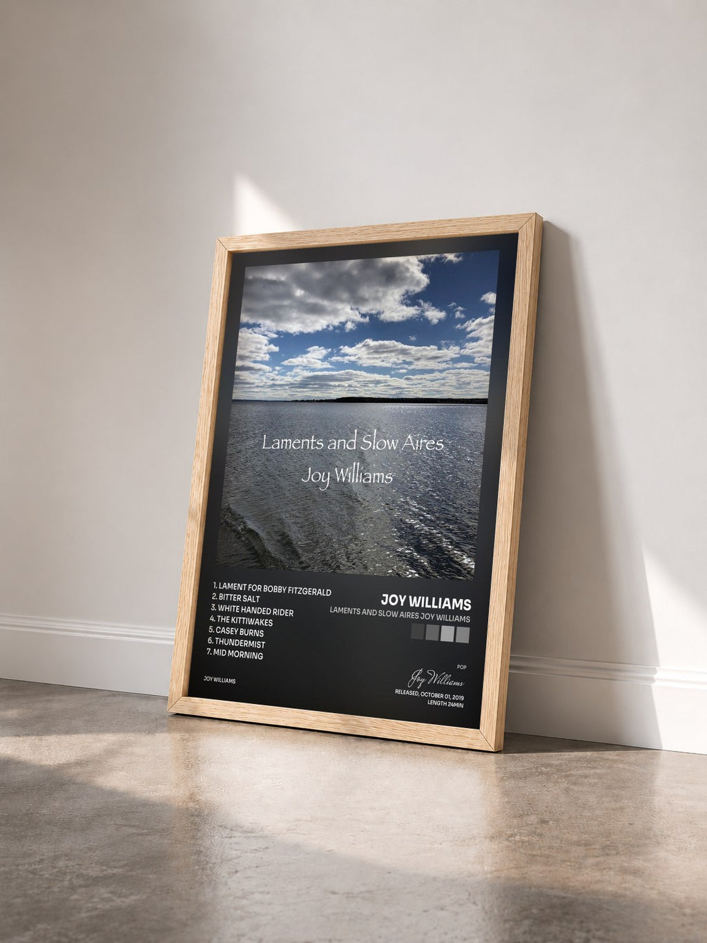 #bois Tableau de l'album Laments and Slow Aires Joy Williams de Joy Williams vu de trois quarts, cadre en bois brut
