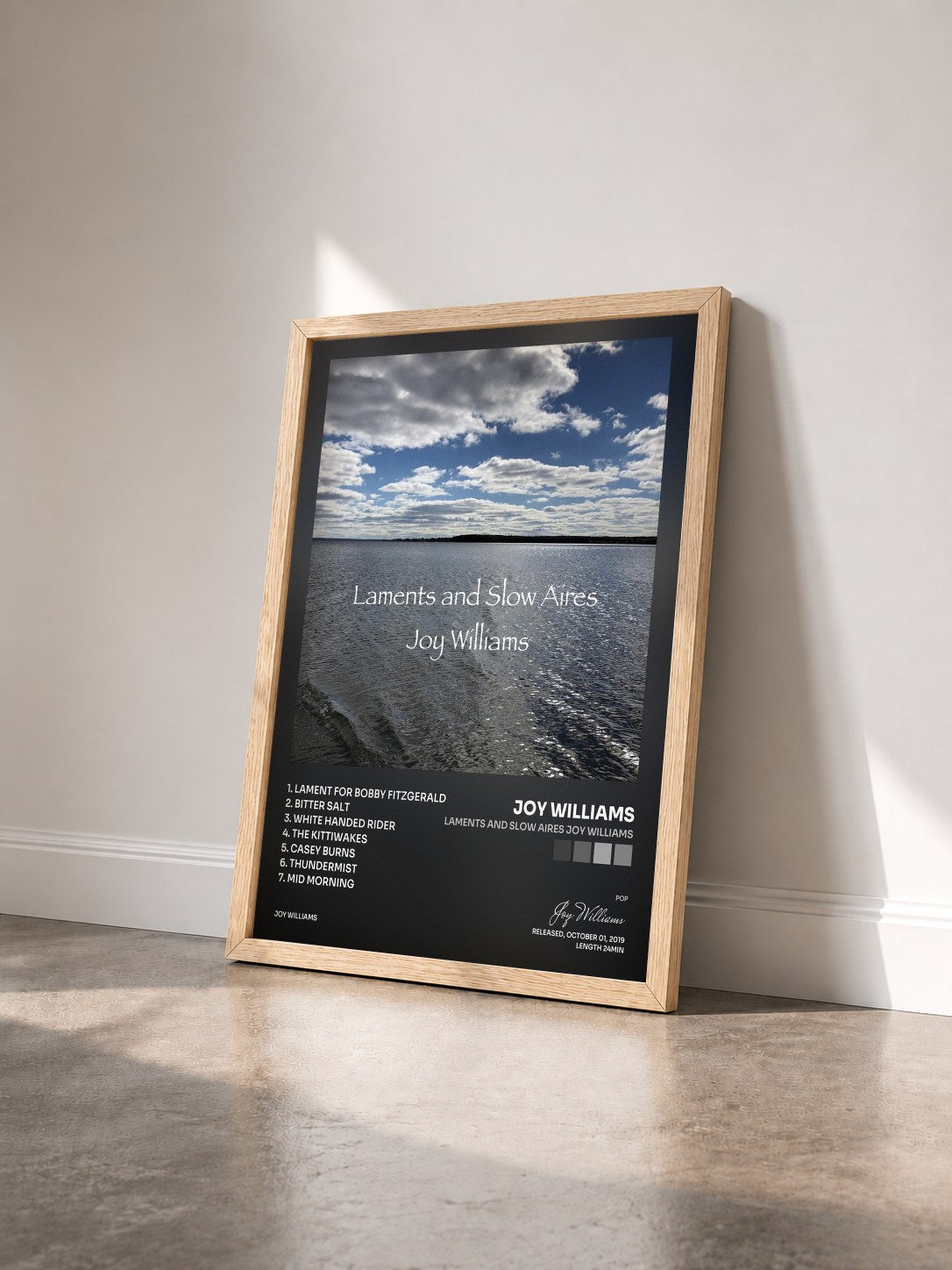 #bois Tableau de l'album Laments and Slow Aires Joy Williams de Joy Williams vu de trois quarts, cadre en bois brut