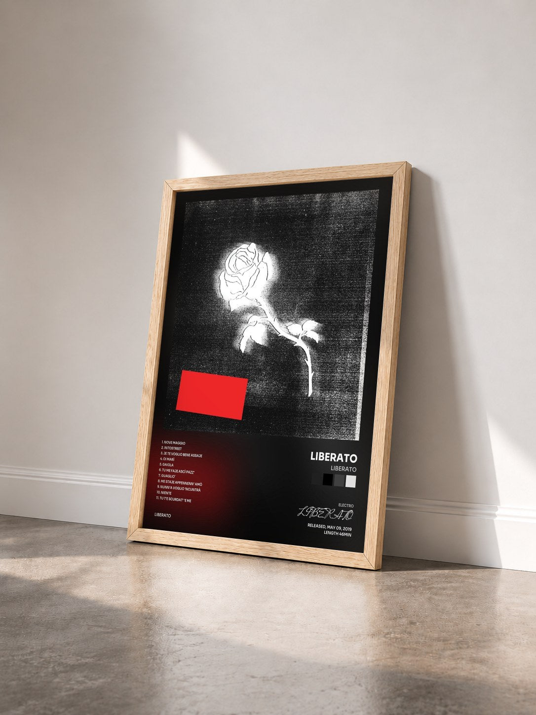 #bois Tableau de l'album LIBERATO de LIBERATO vu de trois quarts, cadre en bois brut