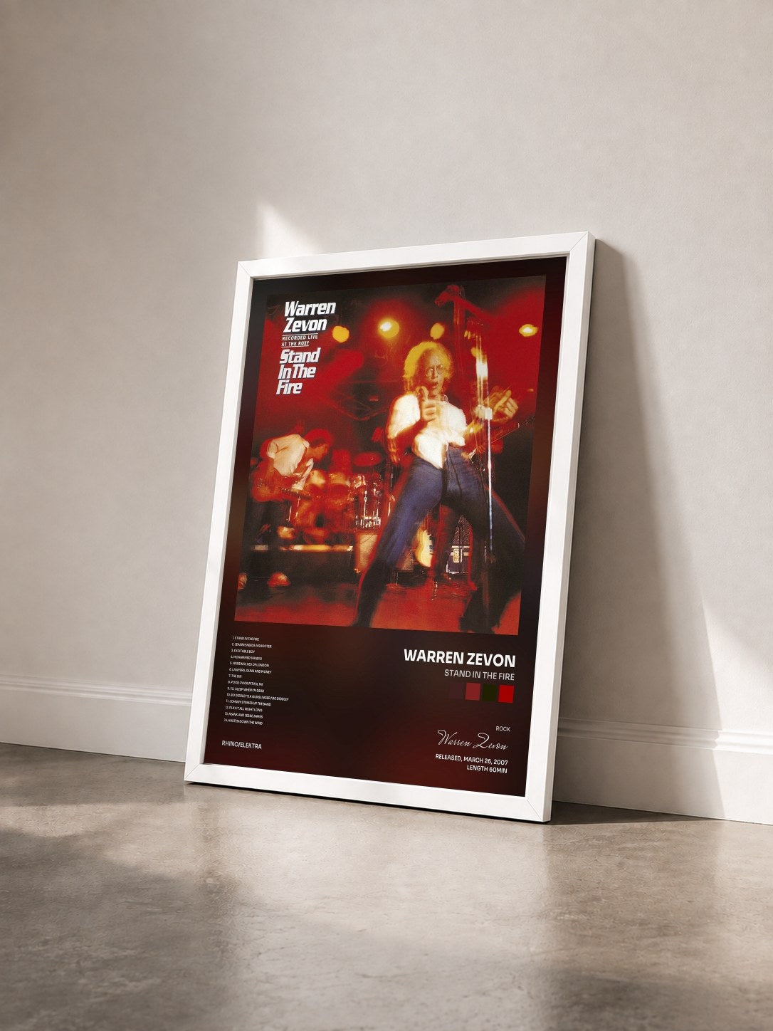 #blanc Tableau de l'album Stand in the Fire de Warren Zevon vu de trois quarts, cadre blanc