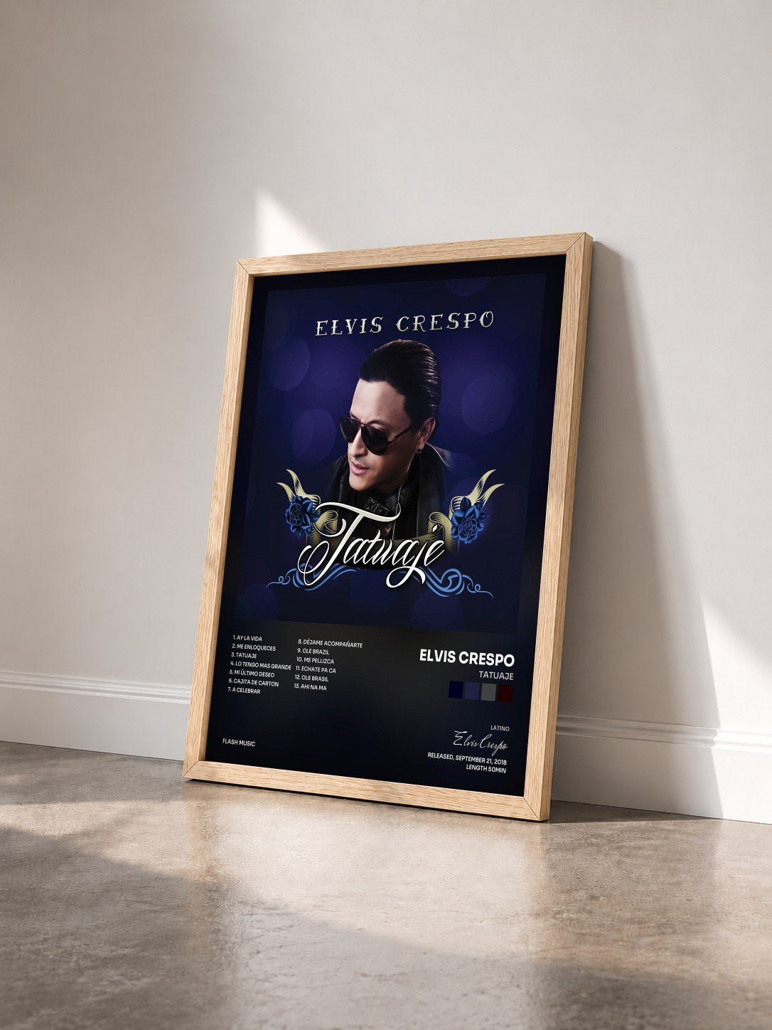 #bois Tableau de l'album Tatuaje de Elvis Crespo vu de trois quarts, cadre en bois brut