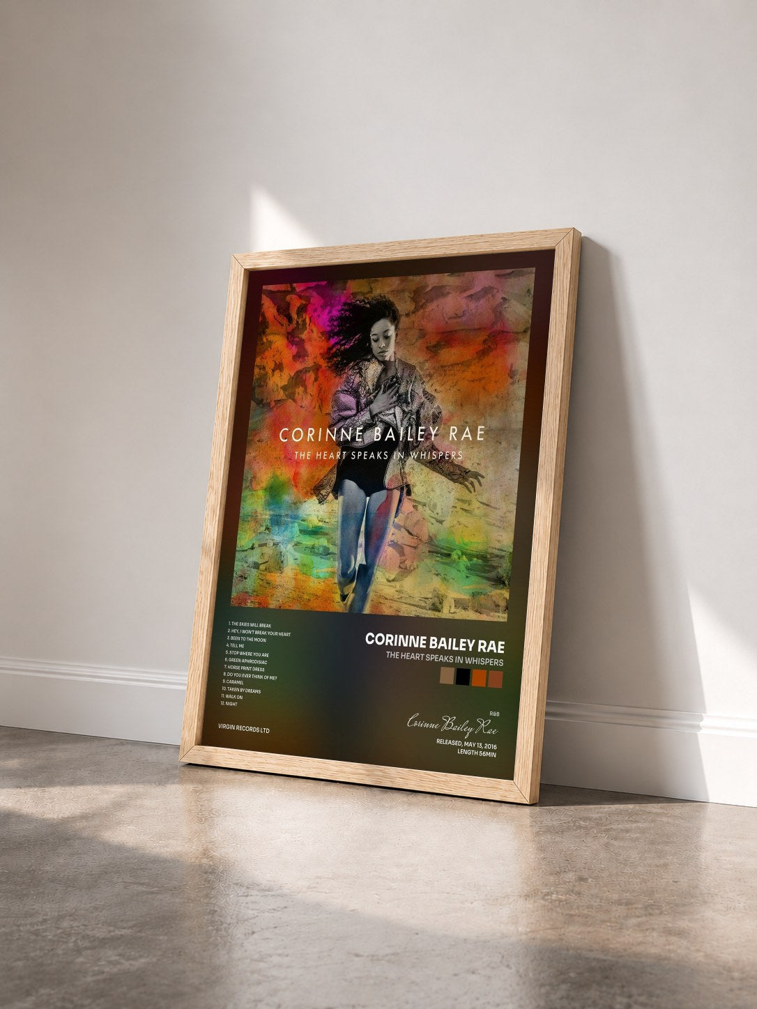 #bois Tableau de l'album The Heart Speaks In Whispers de Corinne Bailey Rae vu de trois quarts, cadre en bois brut