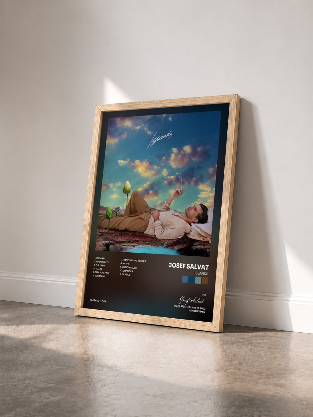 #bois Tableau de l'album Islands de Josef Salvat vu de trois quarts, cadre en bois brut
