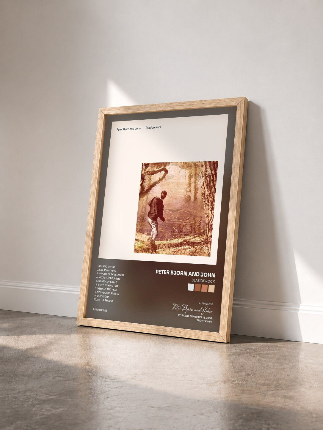 #bois Tableau de l'album Seaside Rock de Peter Bjorn and John vu de trois quarts, cadre en bois brut