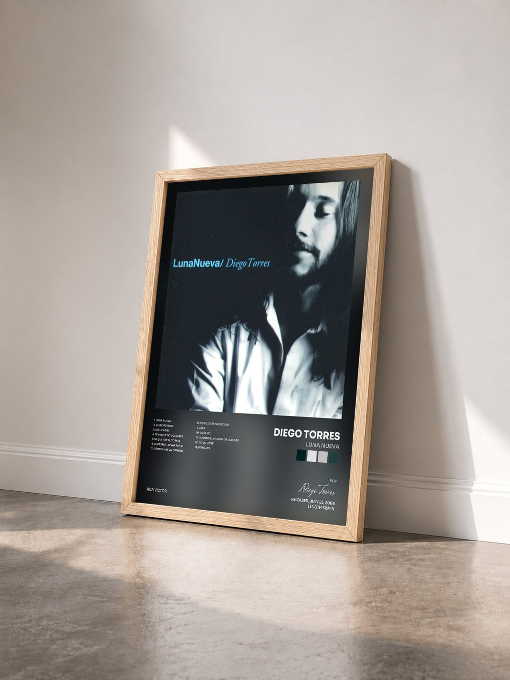 #bois Tableau de l'album Luna Nueva de Diego Torres vu de trois quarts, cadre en bois brut