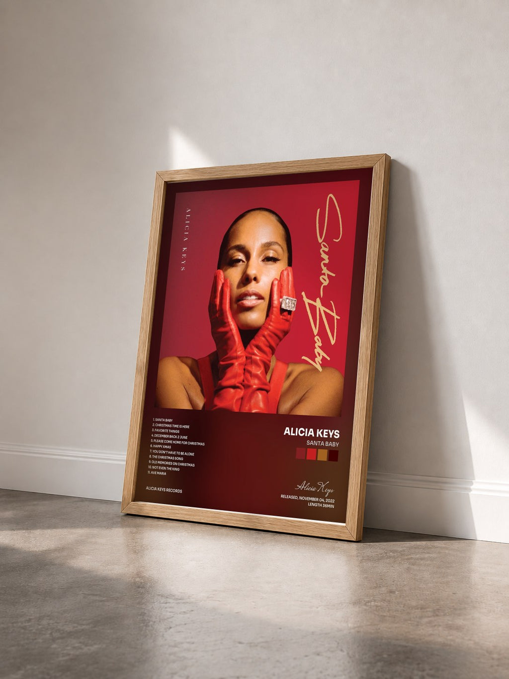 #bois Tableau de l'album Santa Baby de Alicia Keys vu de trois quarts, cadre en bois brut