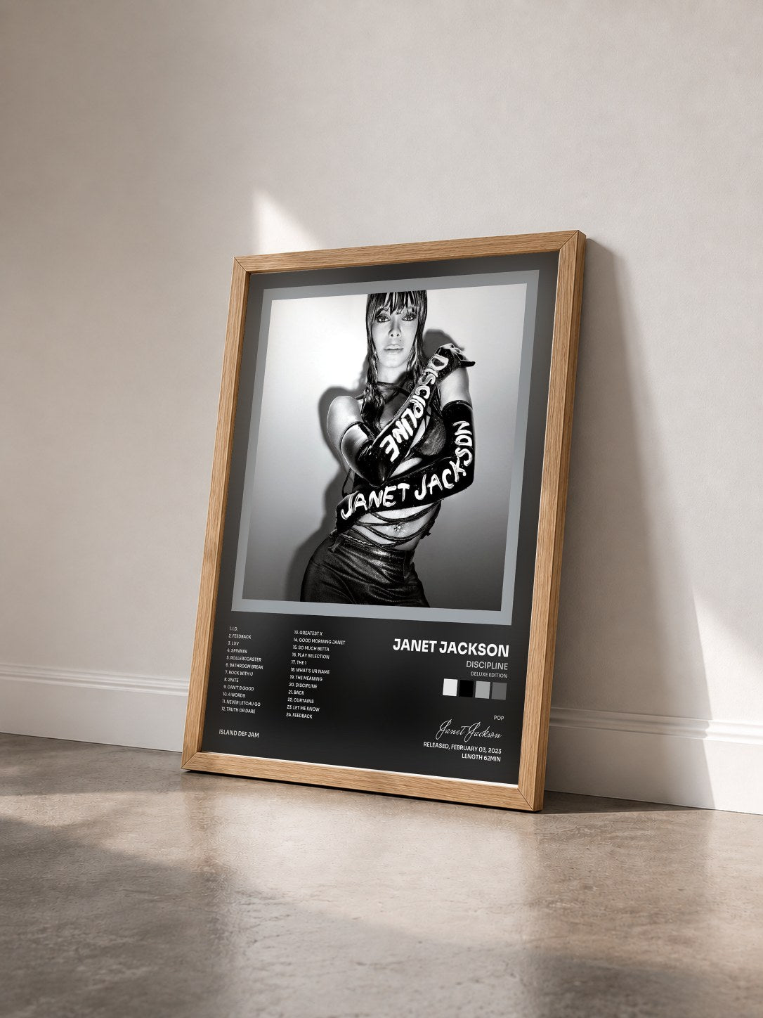 #bois Tableau de l'album Discipline (Deluxe Edition) de Janet Jackson vu de trois quarts, cadre en bois brut