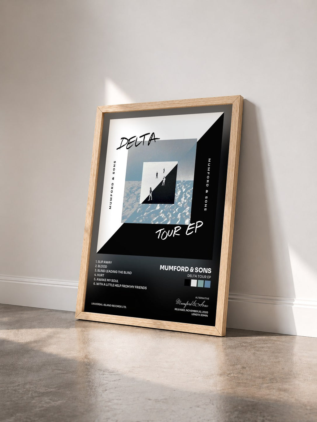 #bois Tableau de l'album Delta Tour EP de Mumford & Sons vu de trois quarts, cadre en bois brut