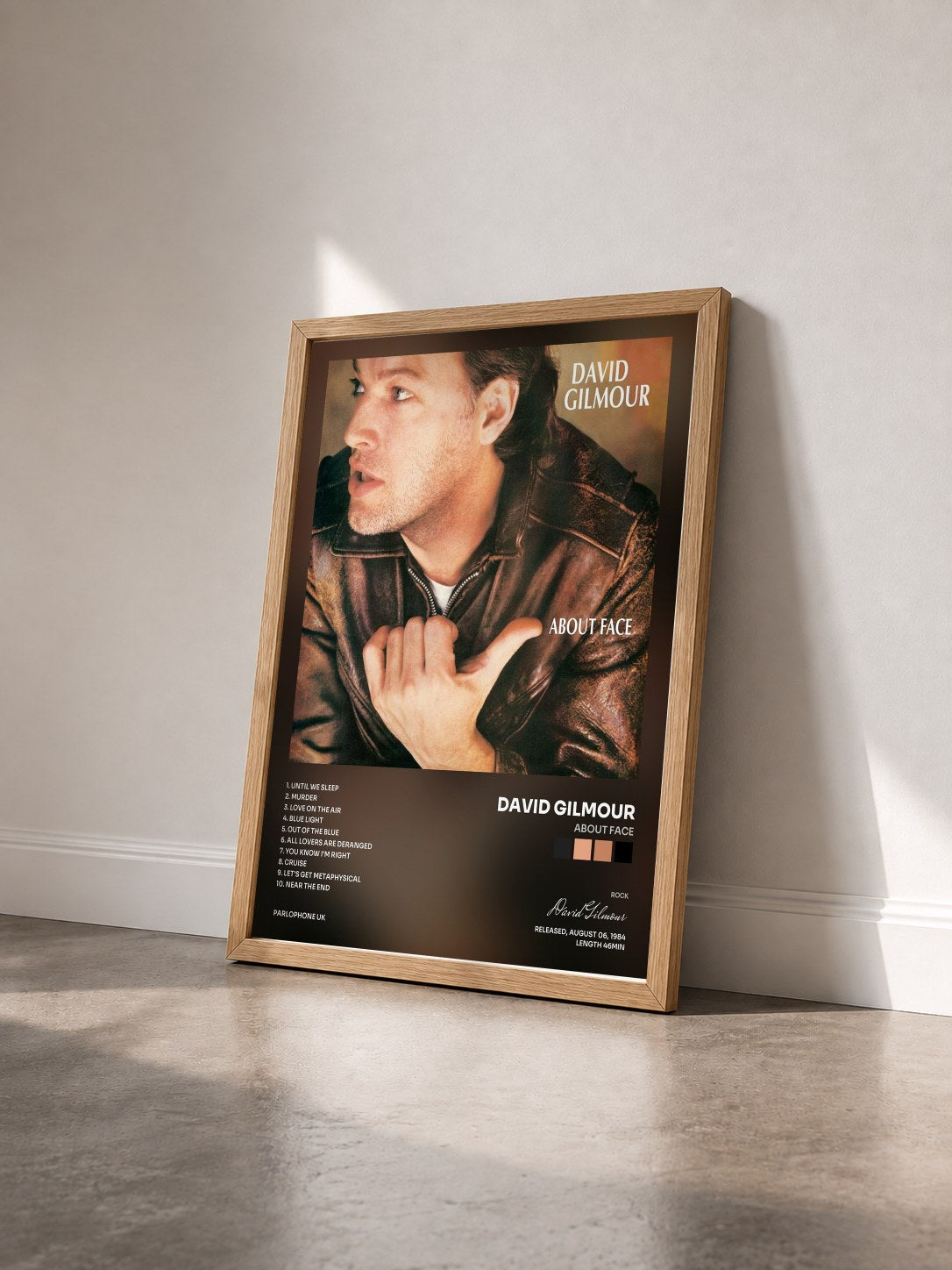 #bois Tableau de l'album About Face de David Gilmour vu de trois quarts, cadre en bois brut