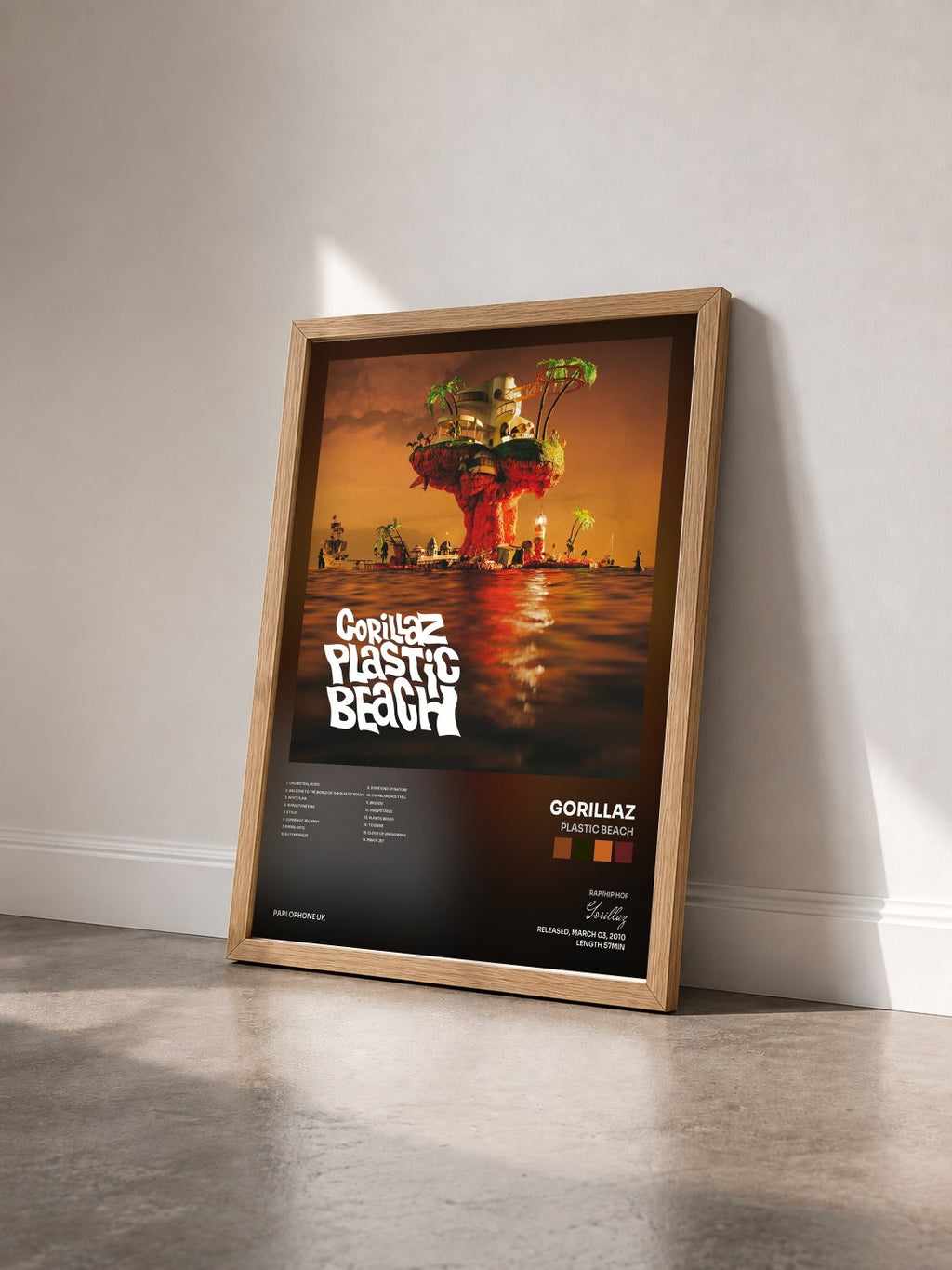 #bois Tableau de l'album Plastic Beach de Gorillaz vu de trois quarts, cadre en bois brut