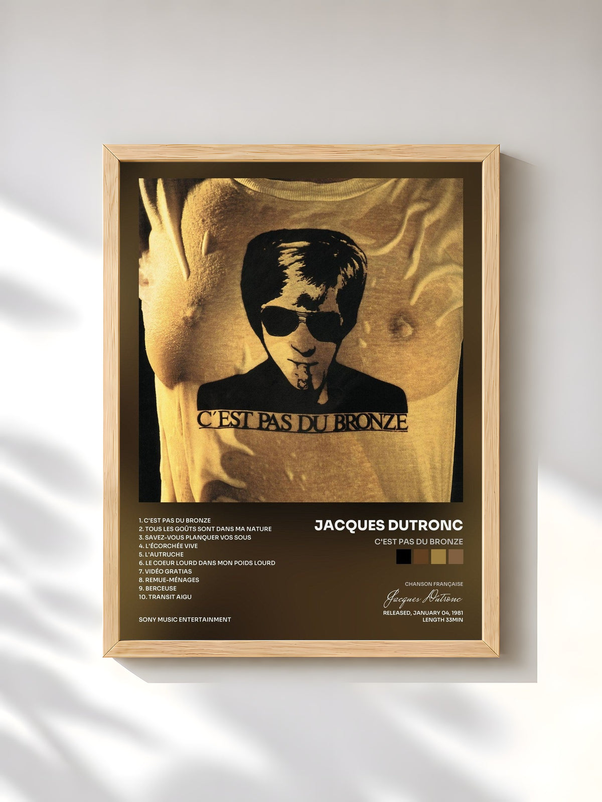 #bois Tableau de l'album C'est pas du bronze de Jacques Dutronc, cadre en bois brut, imprimé et encadré en France