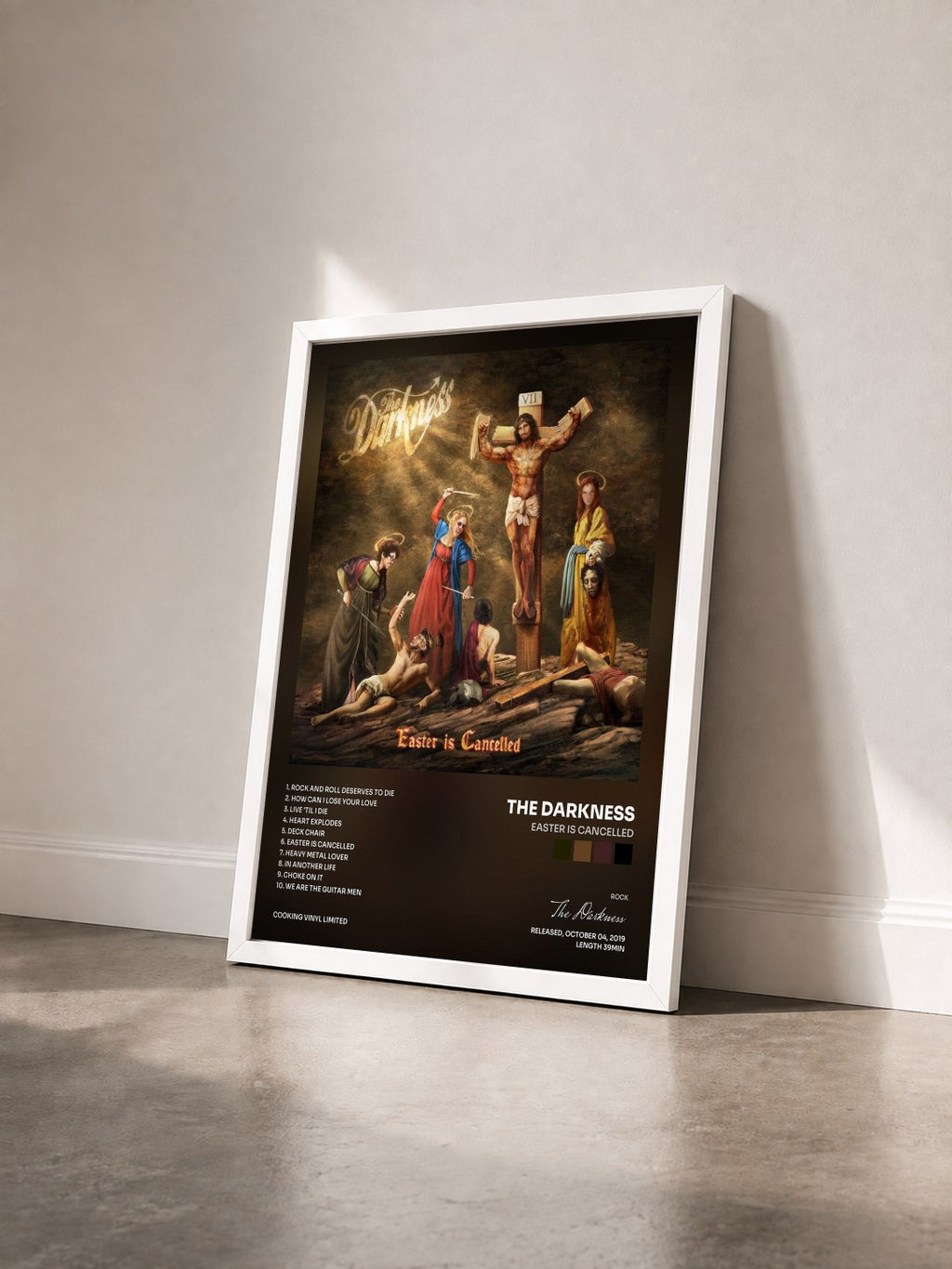 #blanc Tableau de l'album Easter is Cancelled de The Darkness vu de trois quarts, cadre blanc