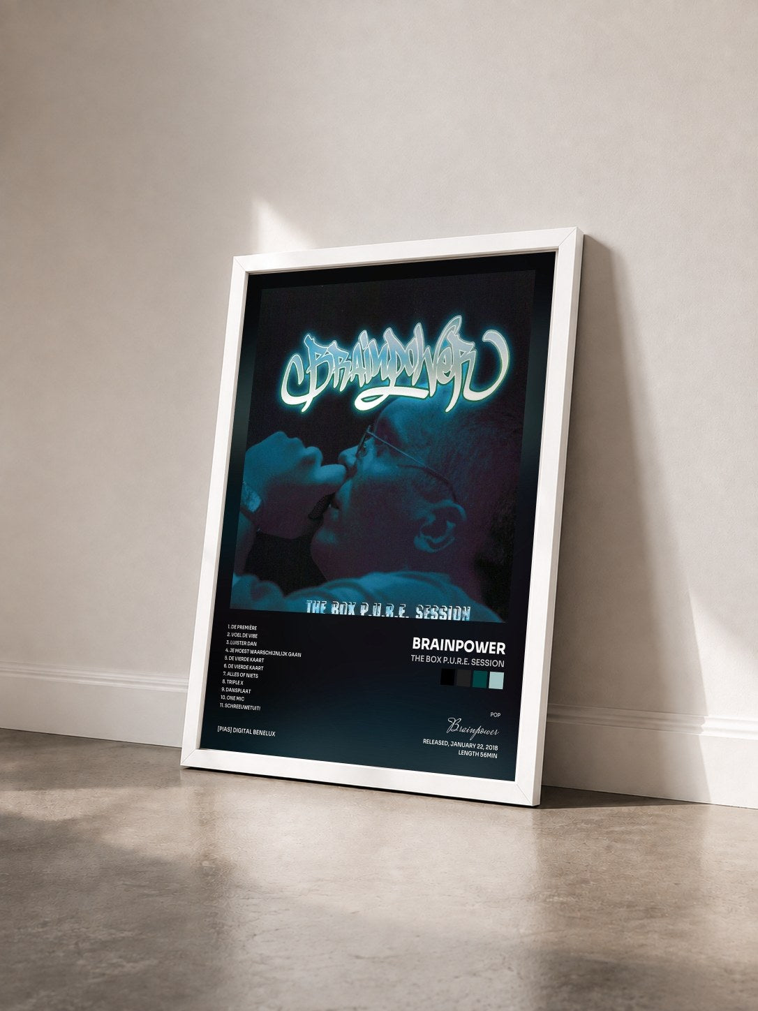 #blanc Tableau de l'album The Box P.U.R.E. Session de Brainpower vu de trois quarts, cadre blanc