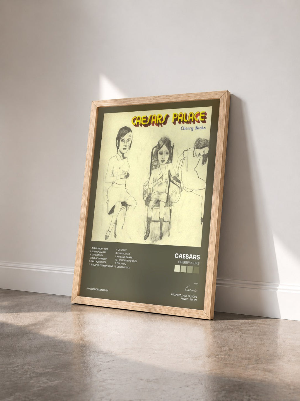 #bois Tableau de l'album Cherry Kicks de Caesars vu de trois quarts, cadre en bois brut