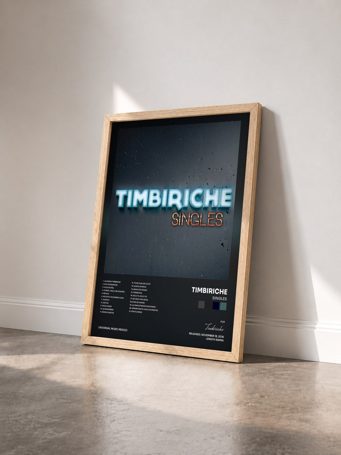 #bois Tableau de l'album Singles de Timbiriche vu de trois quarts, cadre en bois brut