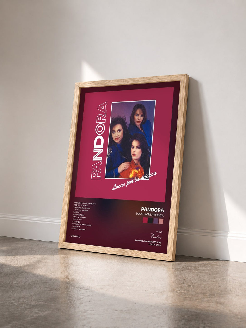 #bois Tableau de l'album Locas Por La Música de Pandora vu de trois quarts, cadre en bois brut