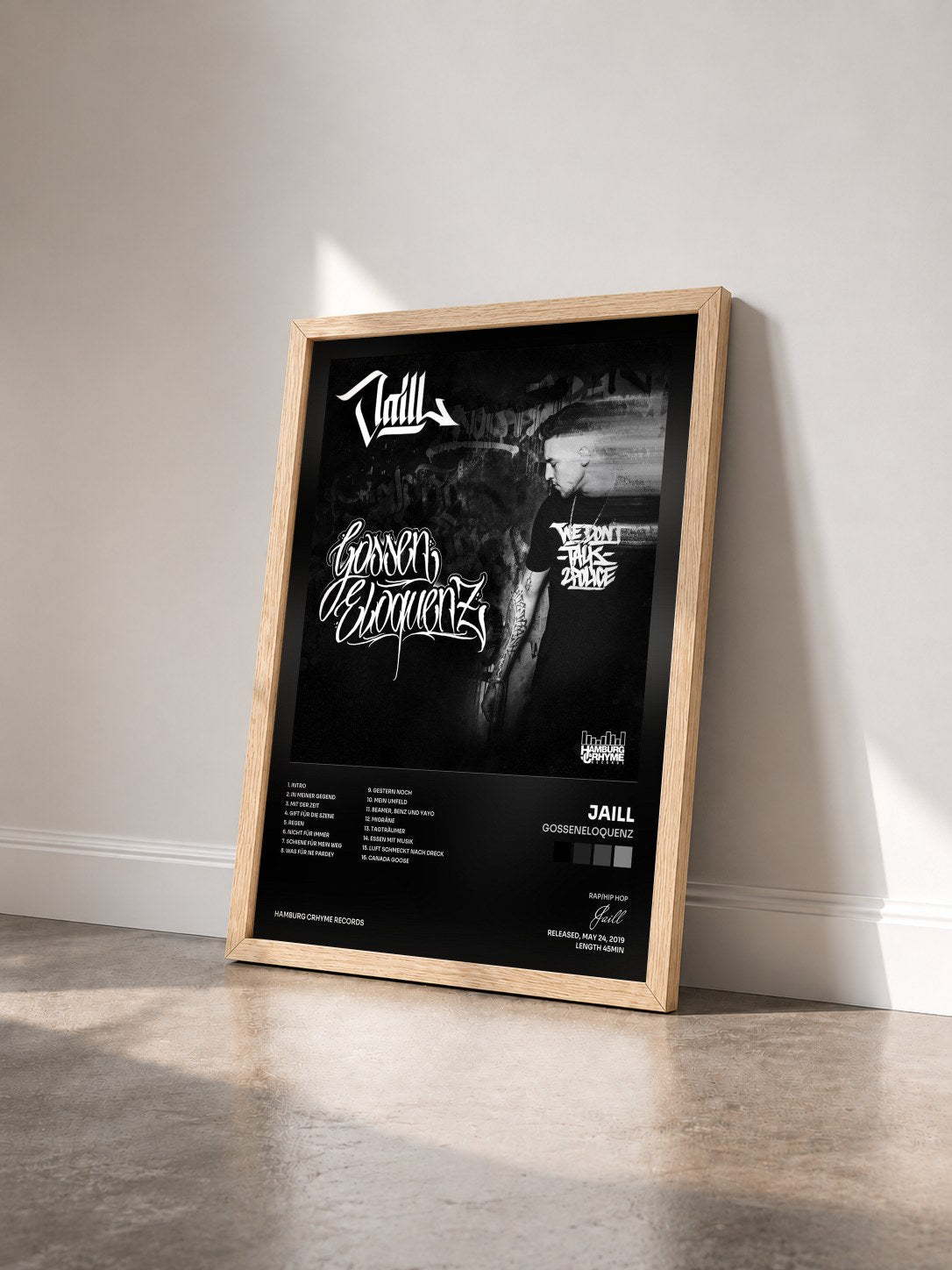 #bois Tableau de l'album GossenEloquenz de Jaill vu de trois quarts, cadre en bois brut
