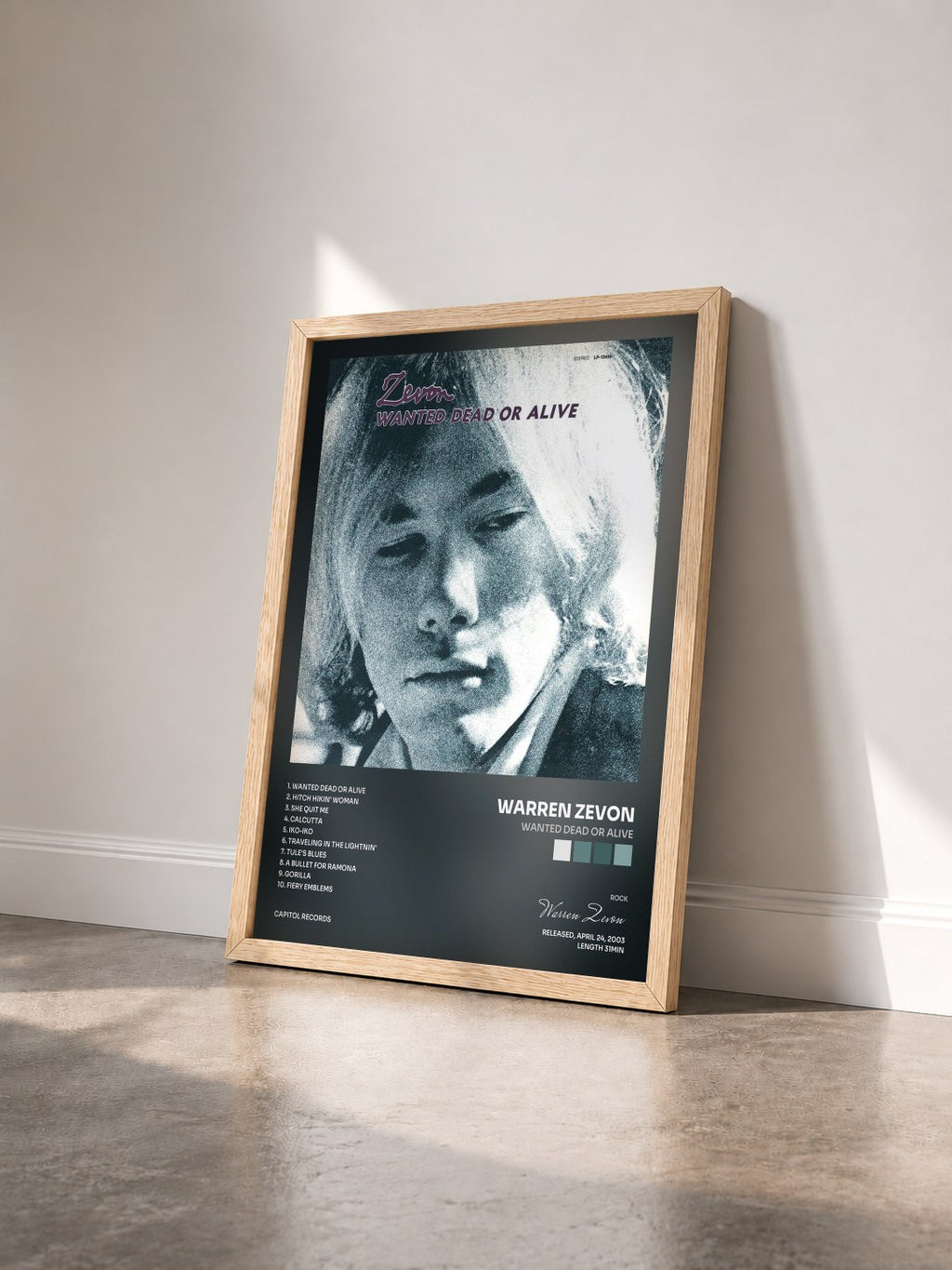 #bois Tableau de l'album Wanted Dead Or Alive de Warren Zevon vu de trois quarts, cadre en bois brut