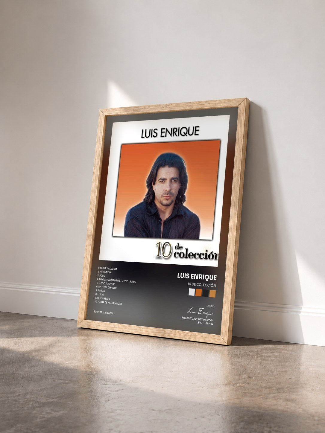 #bois Tableau de l'album 10 De Colección de Luis Enrique vu de trois quarts, cadre en bois brut