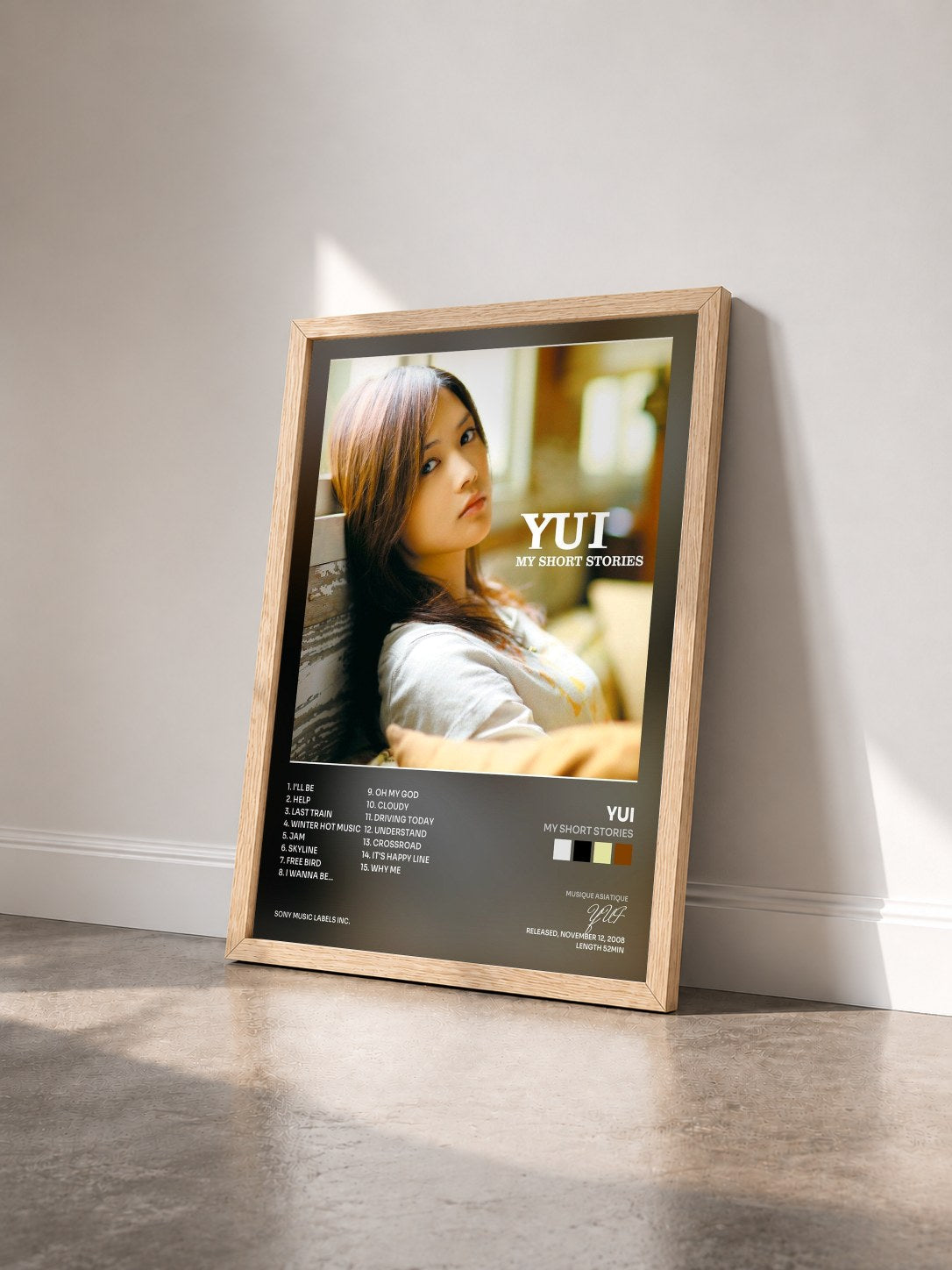 #bois Tableau de l'album MY SHORT STORIES de YUI vu de trois quarts, cadre en bois brut