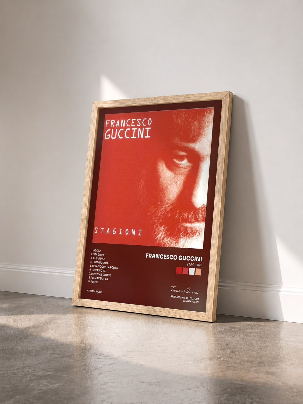#bois Tableau de l'album Stagioni de Francesco Guccini vu de trois quarts, cadre en bois brut