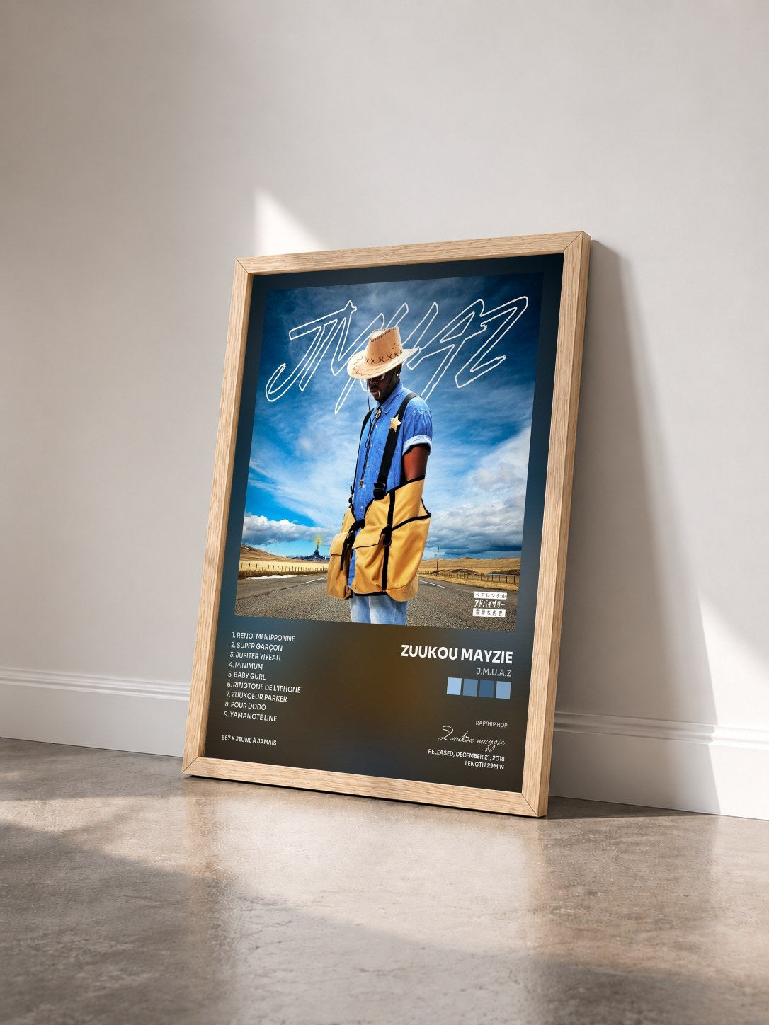 #bois Tableau de l'album J.m.u.a.z de Zuukou mayzie vu de trois quarts, cadre en bois brut