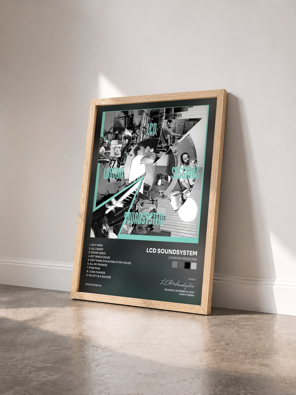 #bois Tableau de l'album London Sessions de LCD Soundsystem vu de trois quarts, cadre en bois brut