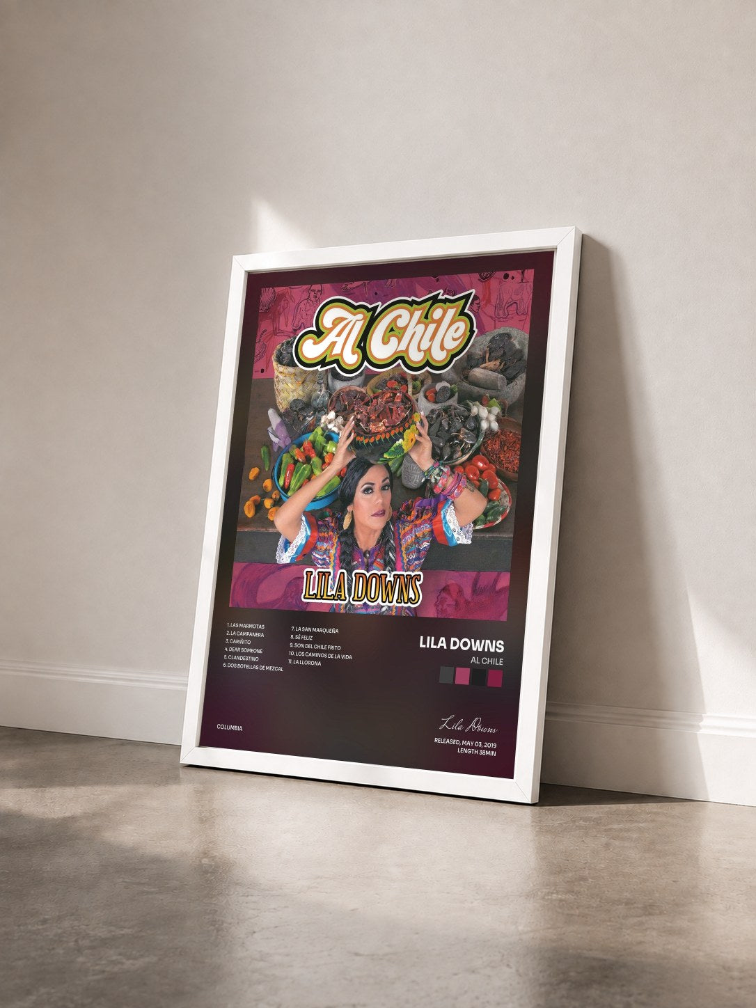 #blanc Tableau de l'album Al Chile de Lila Downs vu de trois quarts, cadre blanc