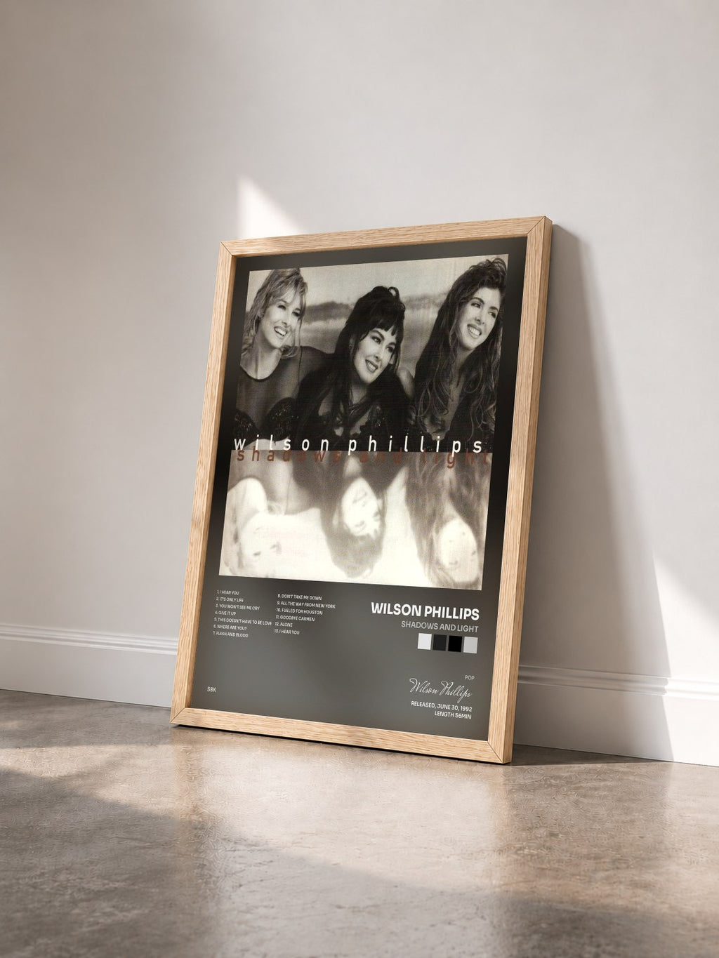 #bois Tableau de l'album Shadows And Light de Wilson Phillips vu de trois quarts, cadre en bois brut