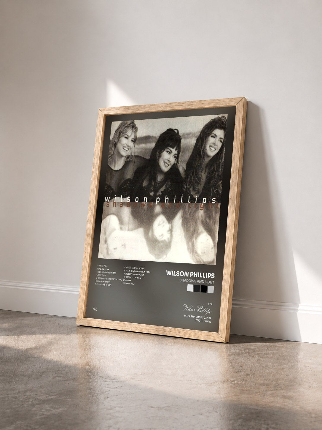 #bois Tableau de l'album Shadows And Light de Wilson Phillips vu de trois quarts, cadre en bois brut