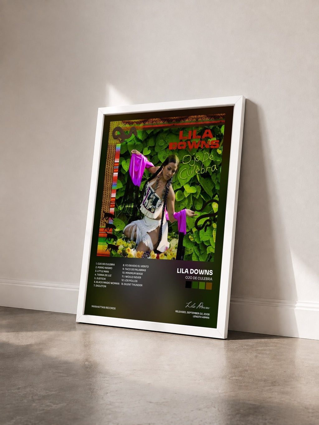#blanc Tableau de l'album Ojo De Culebra de Lila Downs vu de trois quarts, cadre blanc