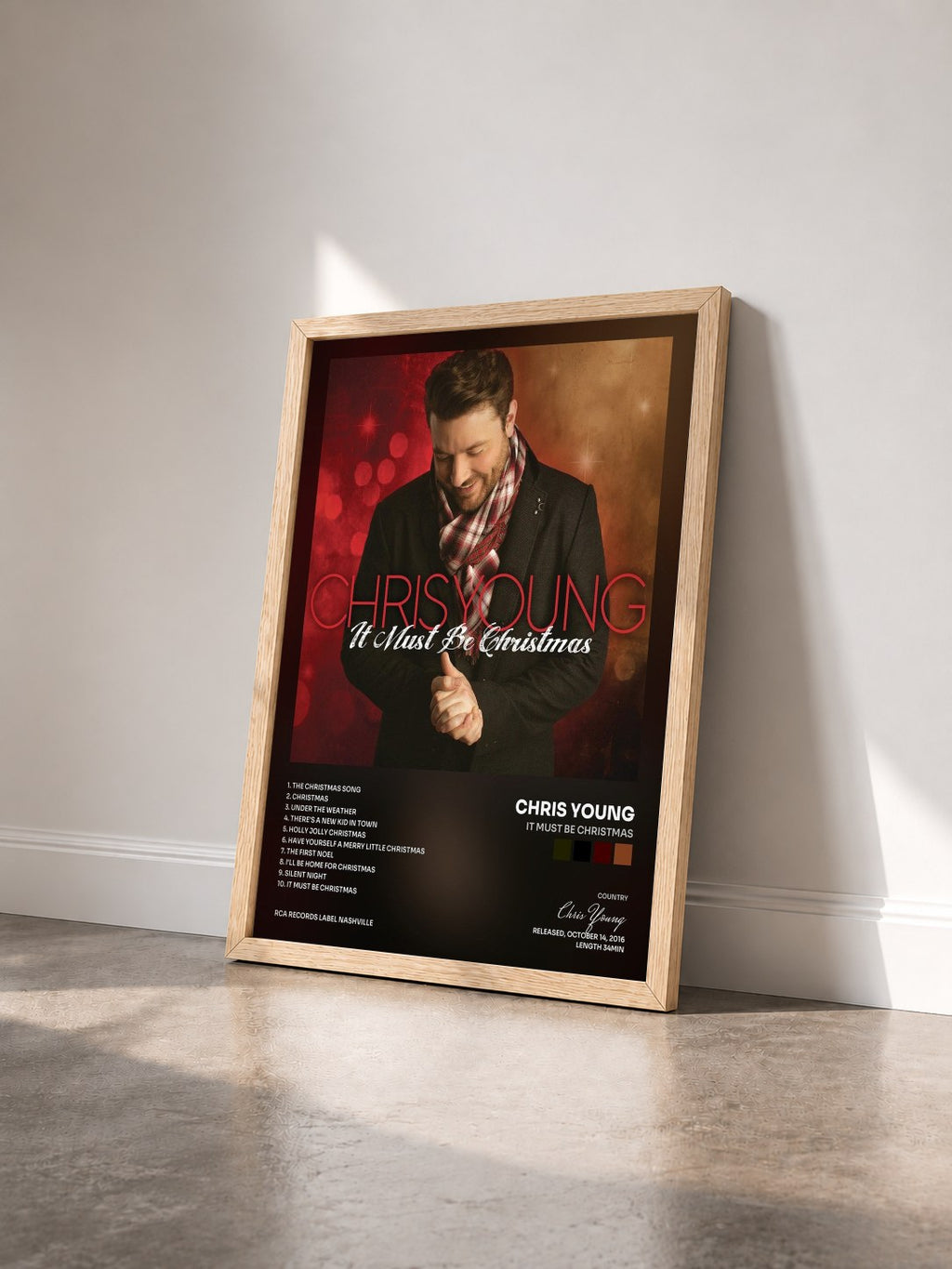 #bois Tableau de l'album It Must Be Christmas de Chris Young vu de trois quarts, cadre en bois brut