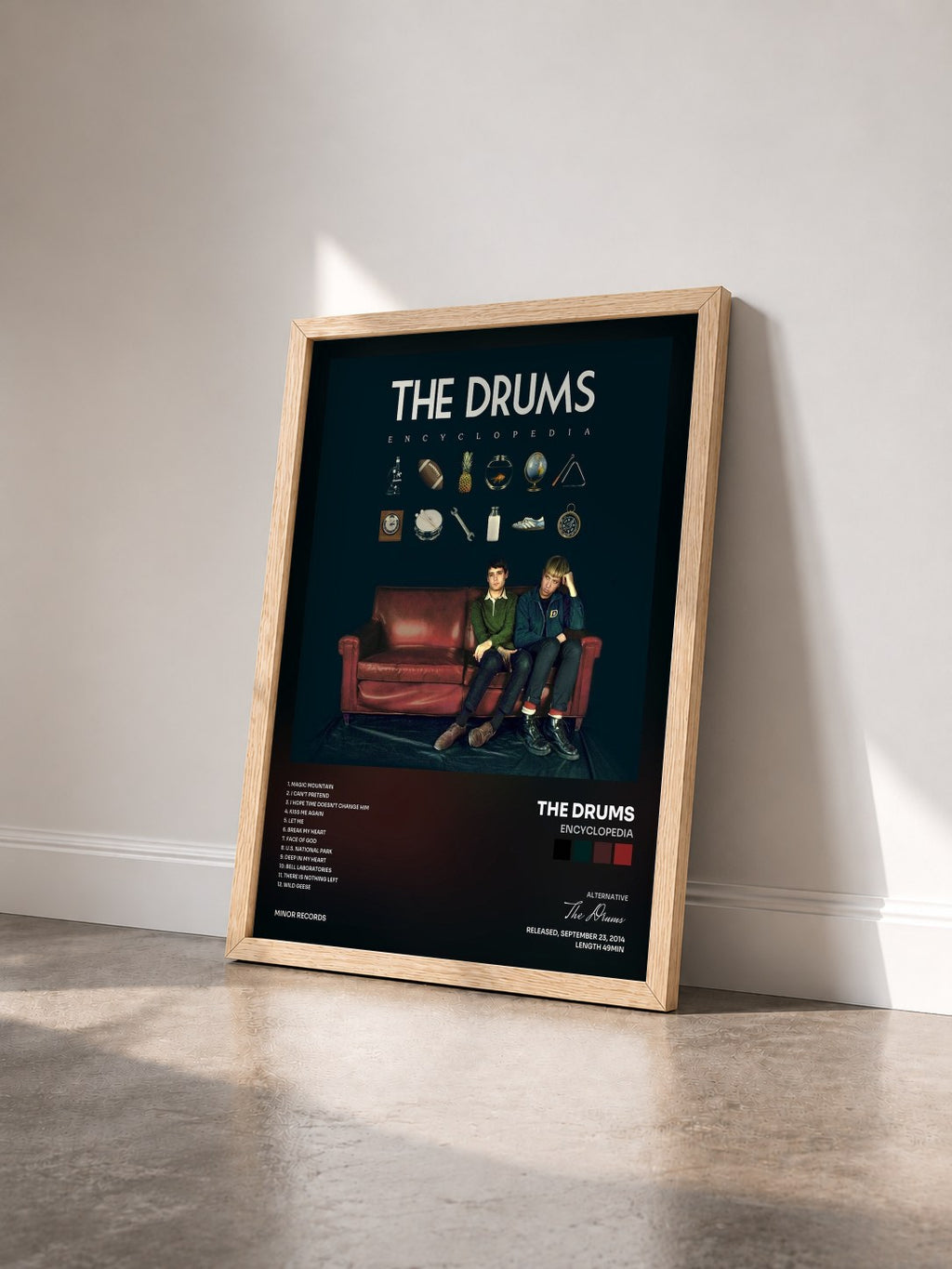#bois Tableau de l'album Encyclopedia de The Drums vu de trois quarts, cadre en bois brut