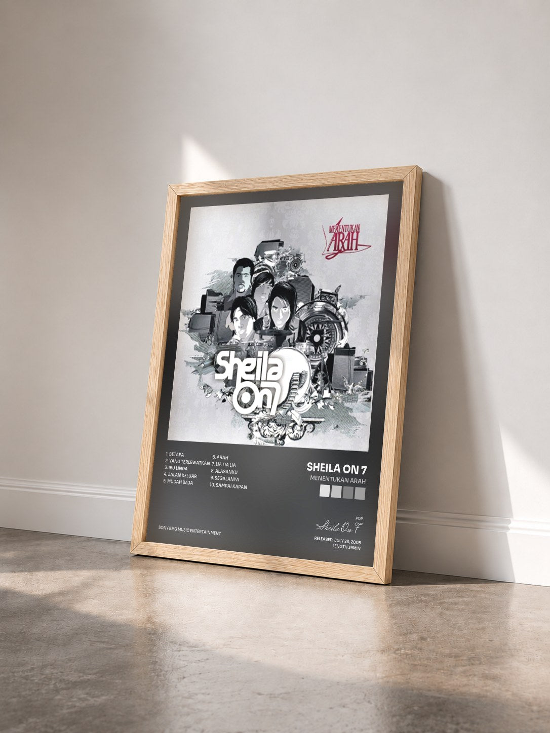 #bois Tableau de l'album Menentukan Arah de Sheila On 7 vu de trois quarts, cadre en bois brut