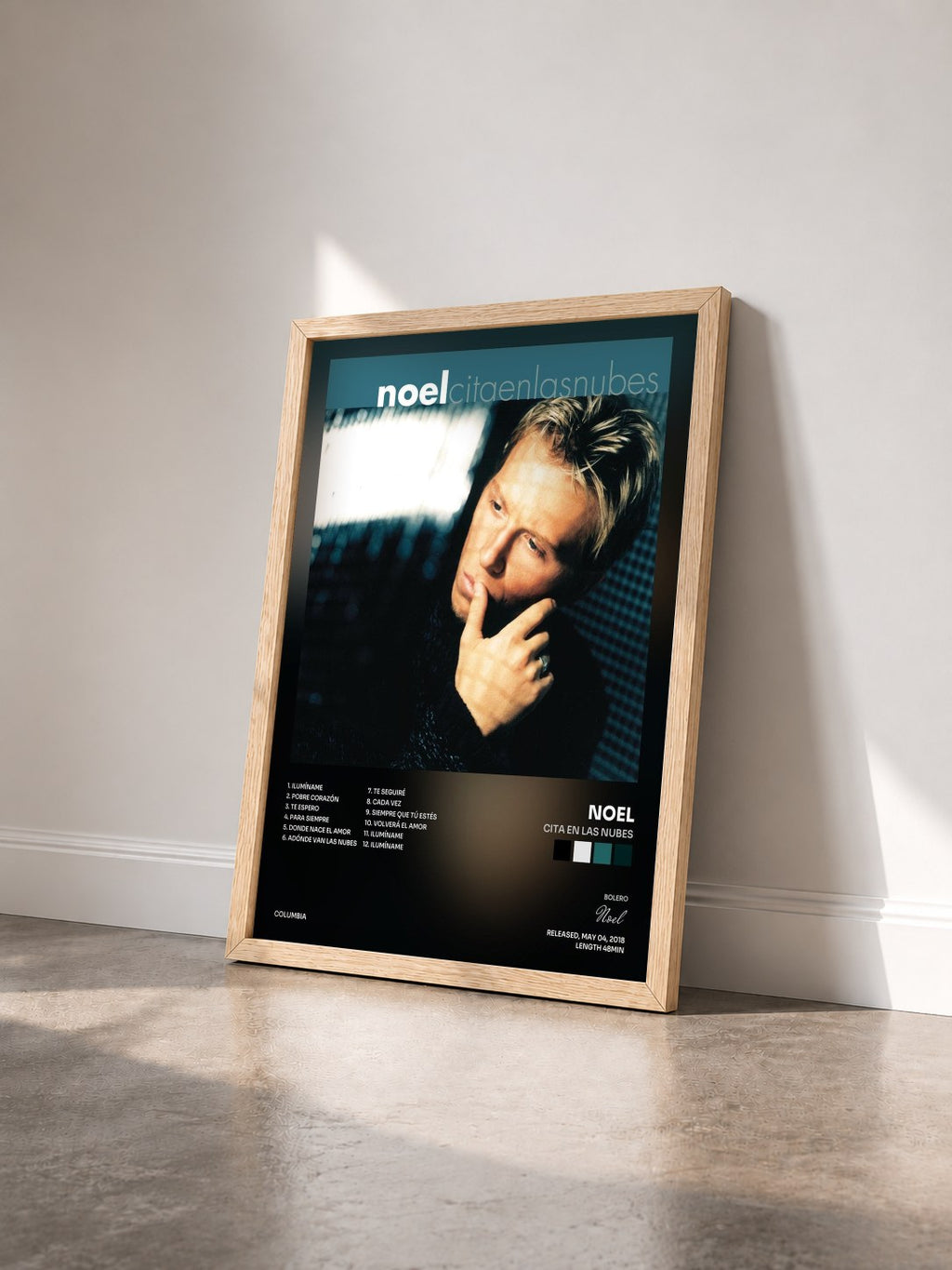 #bois Tableau de l'album Cita en las Nubes de Noel vu de trois quarts, cadre en bois brut