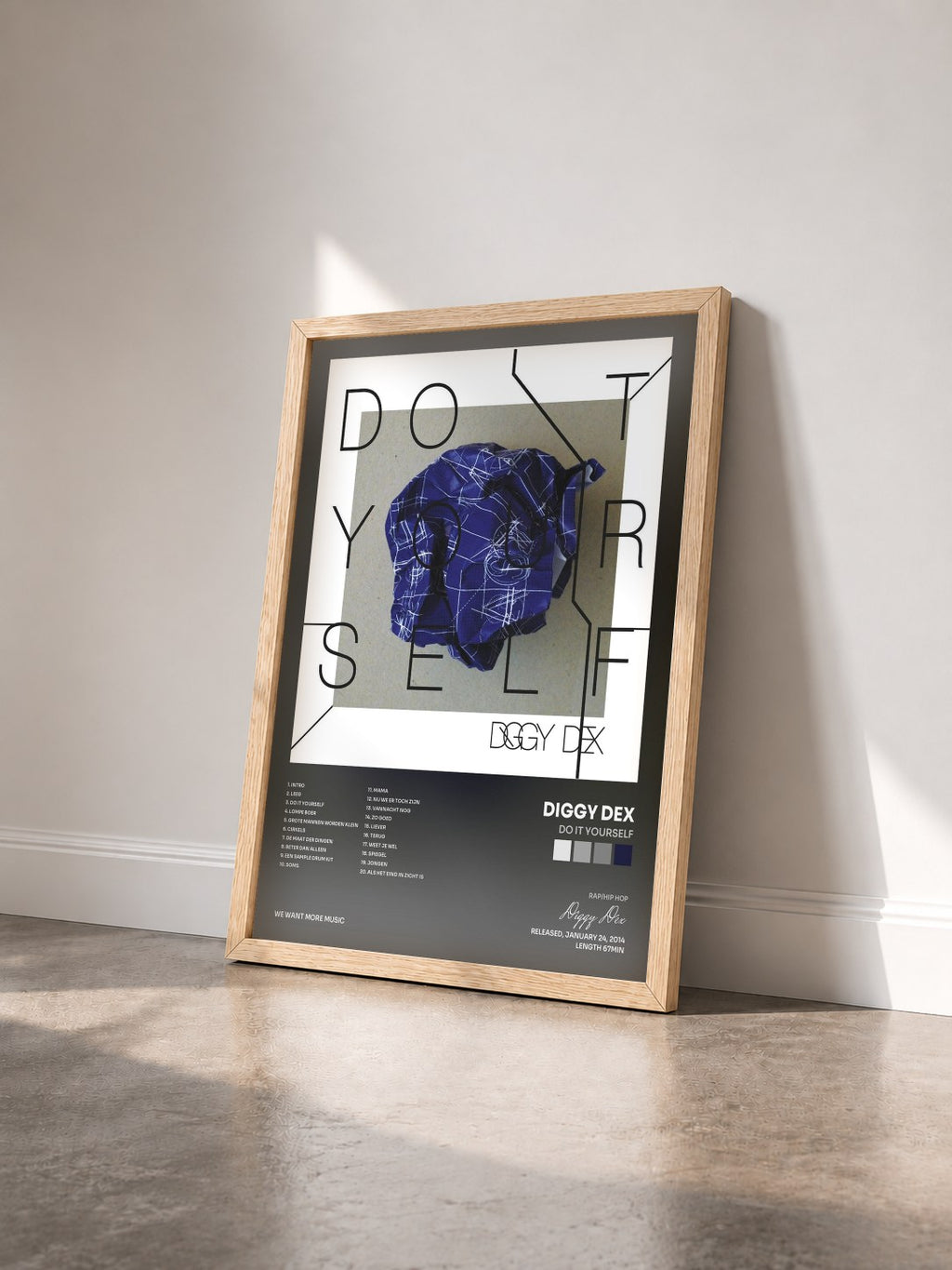 #bois Tableau de l'album Do It Yourself de Diggy Dex vu de trois quarts, cadre en bois brut