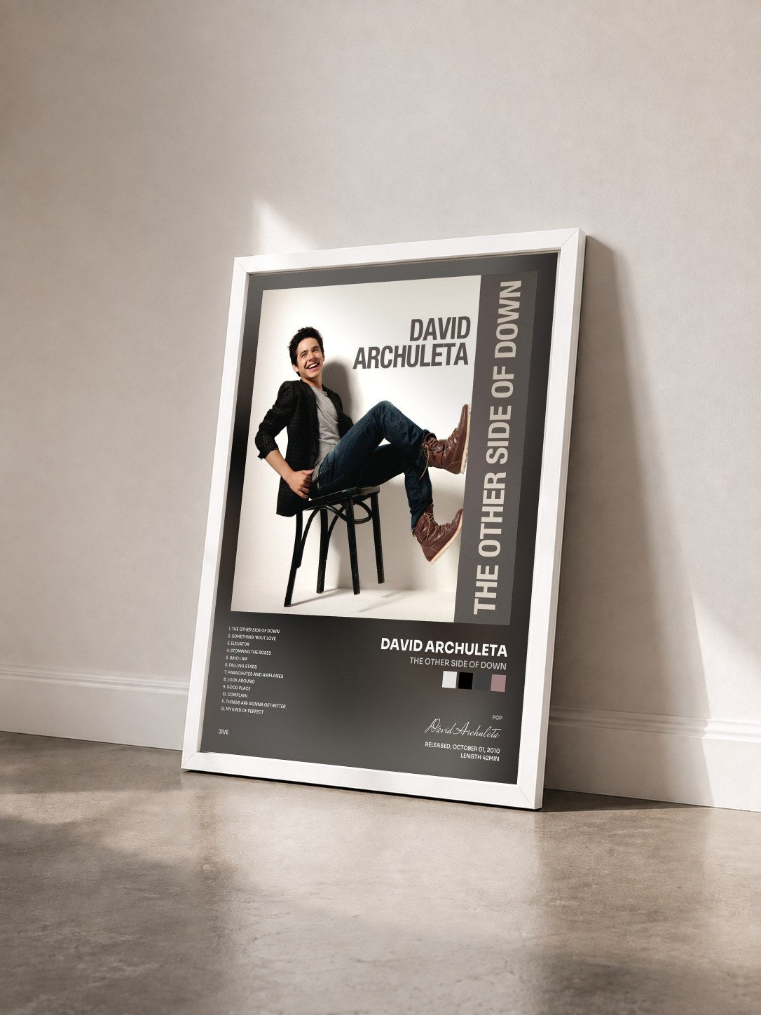 #blanc Tableau de l'album The Other Side of Down de David Archuleta vu de trois quarts, cadre blanc