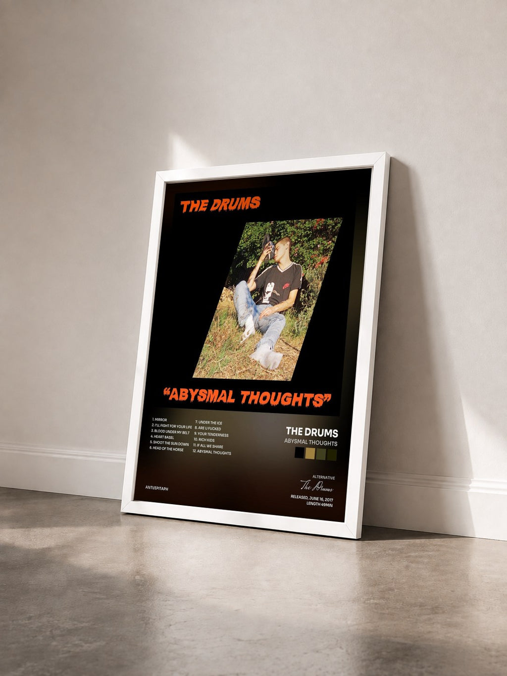 #blanc Tableau de l'album Abysmal Thoughts de The Drums vu de trois quarts, cadre blanc