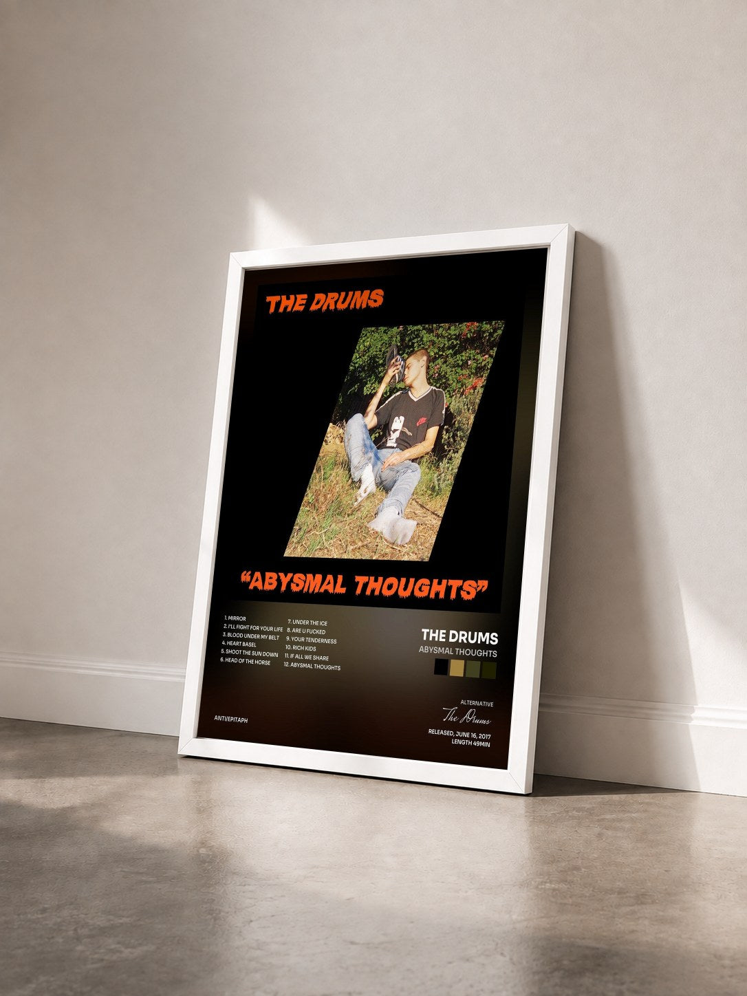 #blanc Tableau de l'album Abysmal Thoughts de The Drums vu de trois quarts, cadre blanc