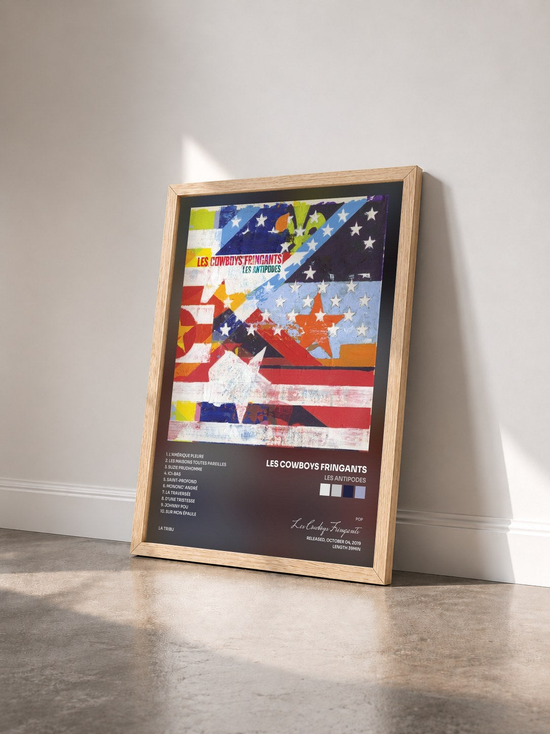 #bois Tableau de l'album Les antipodes de Les Cowboys Fringants vu de trois quarts, cadre en bois brut