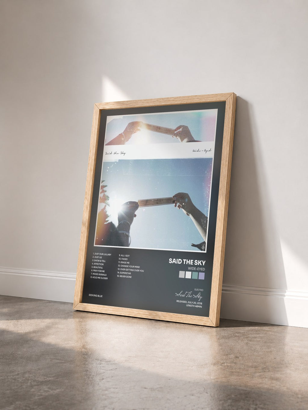 #bois Tableau de l'album Wide-Eyed de Said The Sky vu de trois quarts, cadre en bois brut