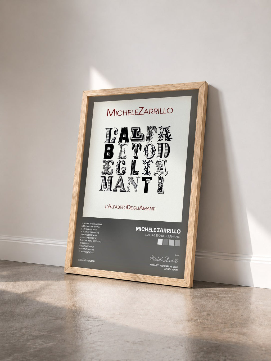 #bois Tableau de l'album L'Alfabeto Degli Amanti de Michele Zarrillo vu de trois quarts, cadre en bois brut