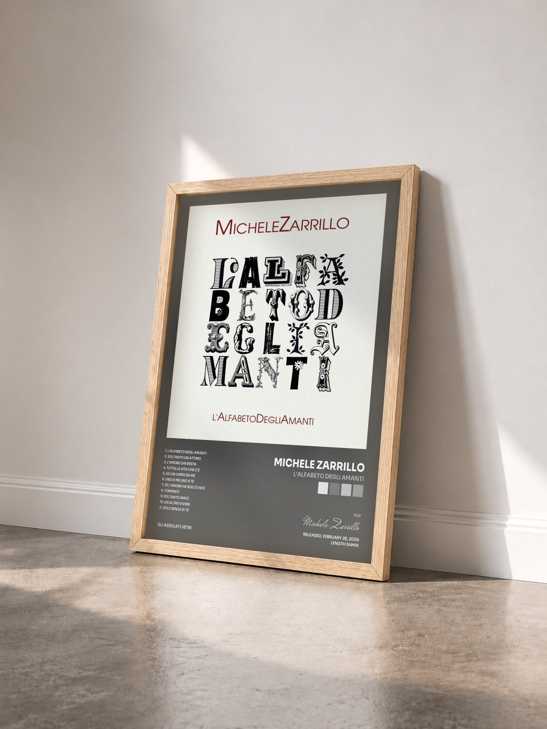 #bois Tableau de l'album L'Alfabeto Degli Amanti de Michele Zarrillo vu de trois quarts, cadre en bois brut