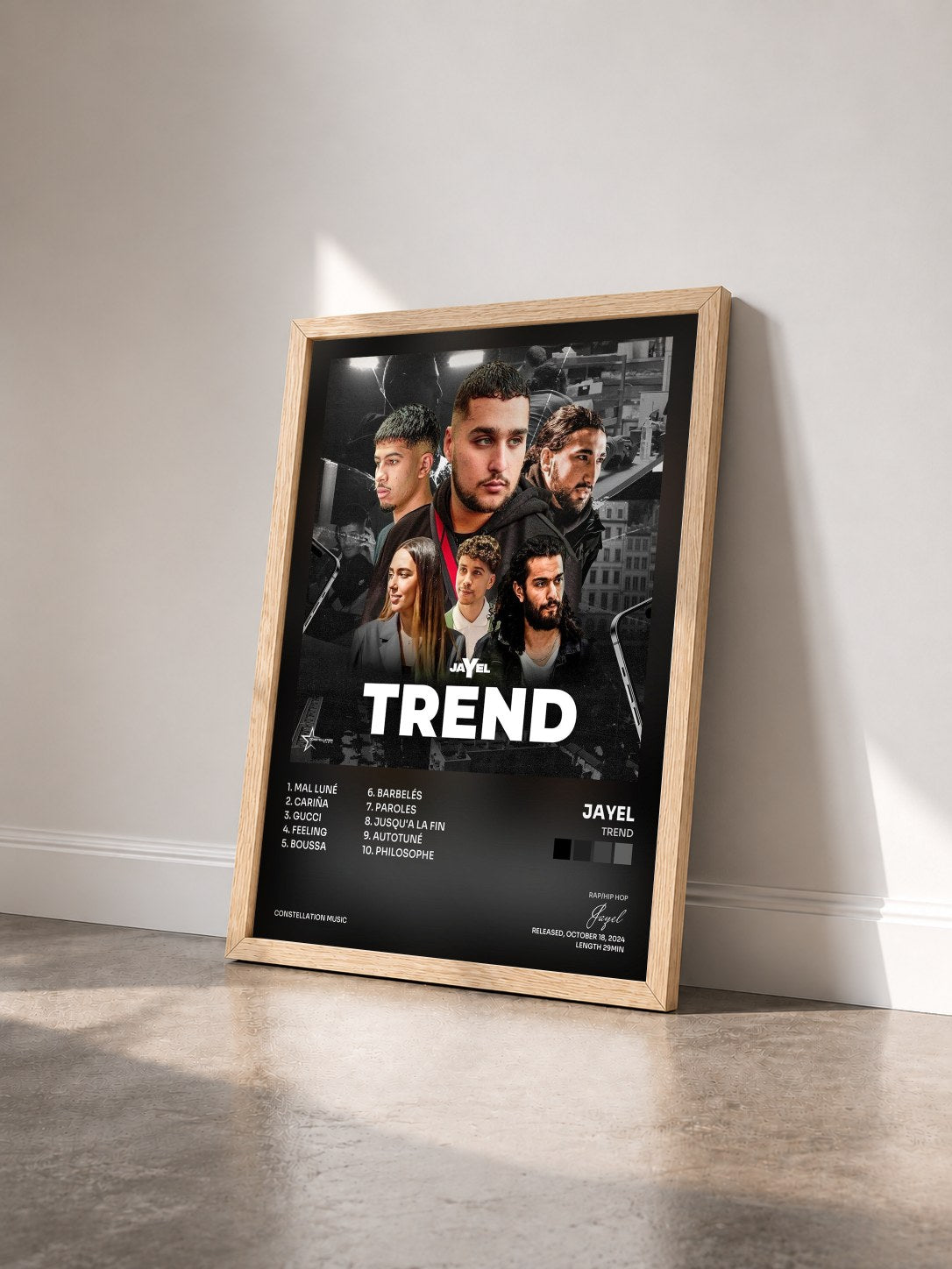#bois Tableau de l'album Trend de Jayel vu de trois quarts, cadre en bois brut