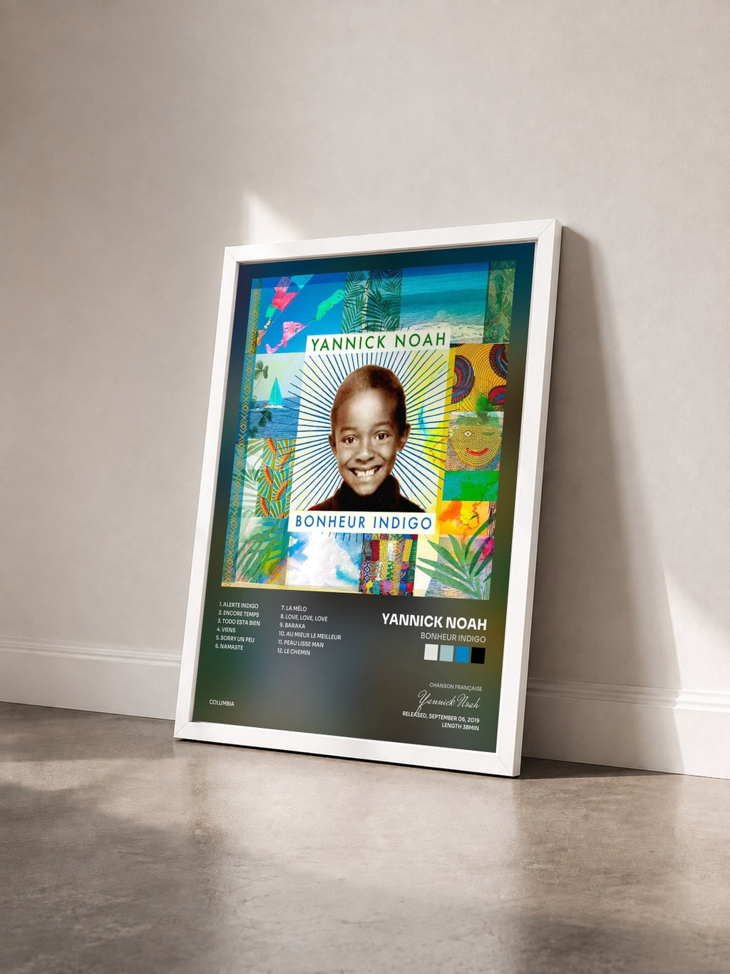 #blanc Tableau de l'album Bonheur indigo de Yannick Noah vu de trois quarts, cadre blanc