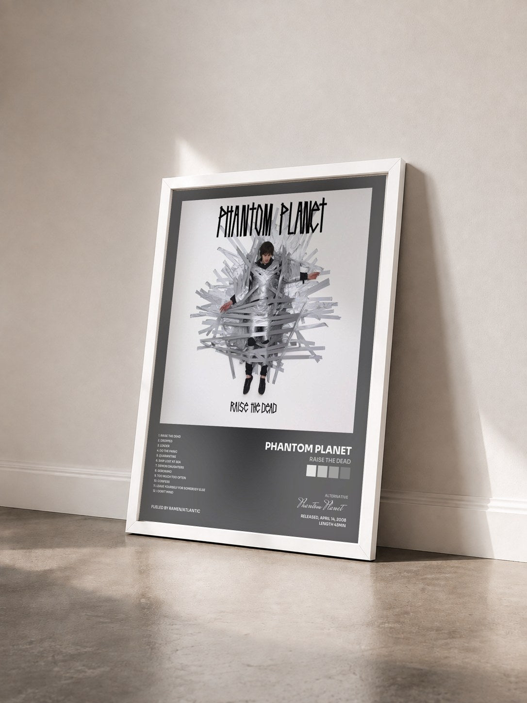 #blanc Tableau de l'album Raise The Dead de Phantom Planet vu de trois quarts, cadre blanc
