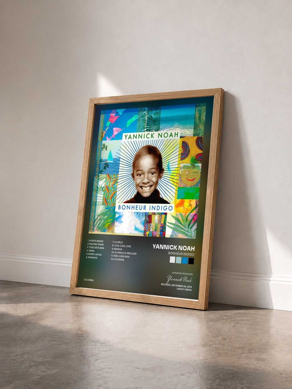 #bois Tableau de l'album Bonheur indigo de Yannick Noah vu de trois quarts, cadre en bois brut