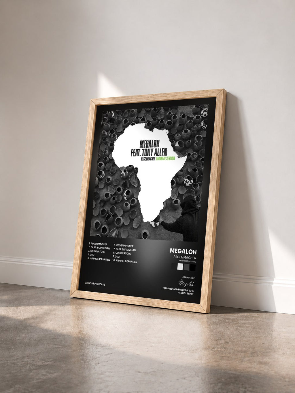 #bois Tableau de l'album Regenmacher (Afrobeat Session) de Megaloh vu de trois quarts, cadre en bois brut