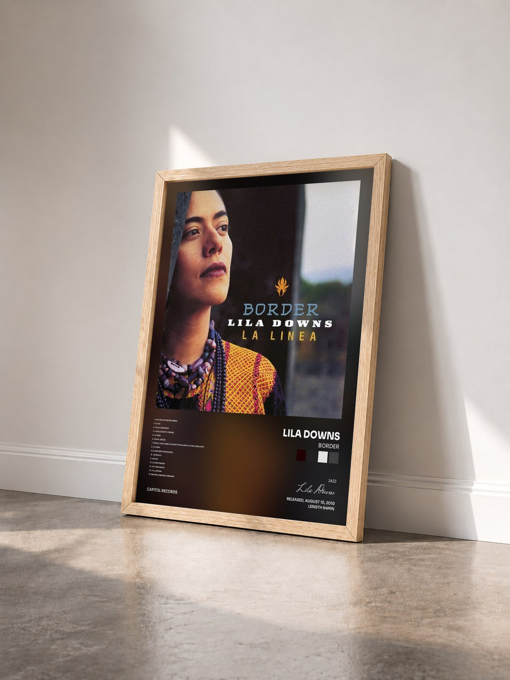 #bois Tableau de l'album Border de Lila Downs vu de trois quarts, cadre en bois brut